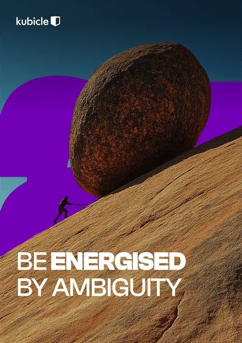 Kubicle value: Be energised by ambiguity. A figure pushes a boulder up a slope.